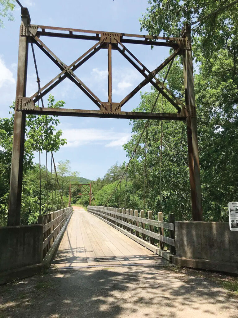 The Sylamore Creek bridge has been a part of the landscape since 1914. Photos courtesy of Julie Kohl, Seek Adventures Media and the Stone County Historical Society.