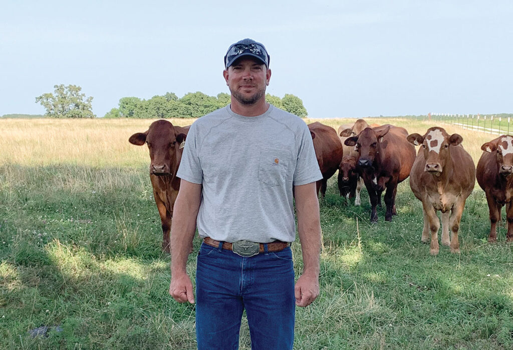Jeffrey Hardison for Elkland, Missouri with his herd. Jeffrey is a lineman for Springfield City Utilities and raise beefmaster and crossbred cattle. Photo by Amanda Bradley. 