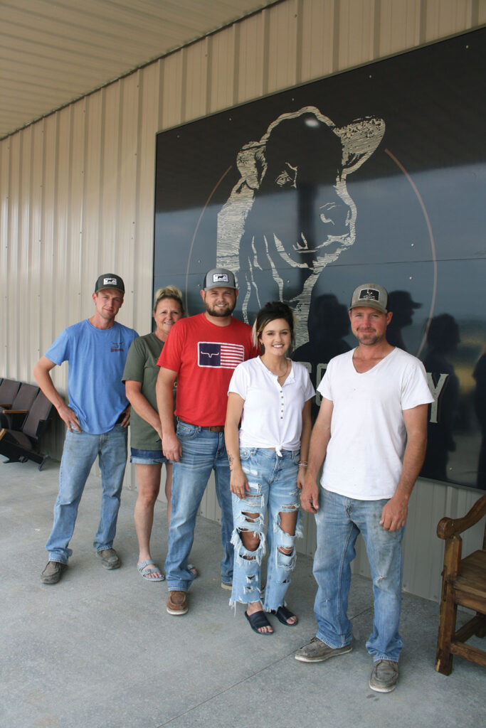 Employees outside Wright County Sale Barn. Photo by Julie Turner-Crawford.