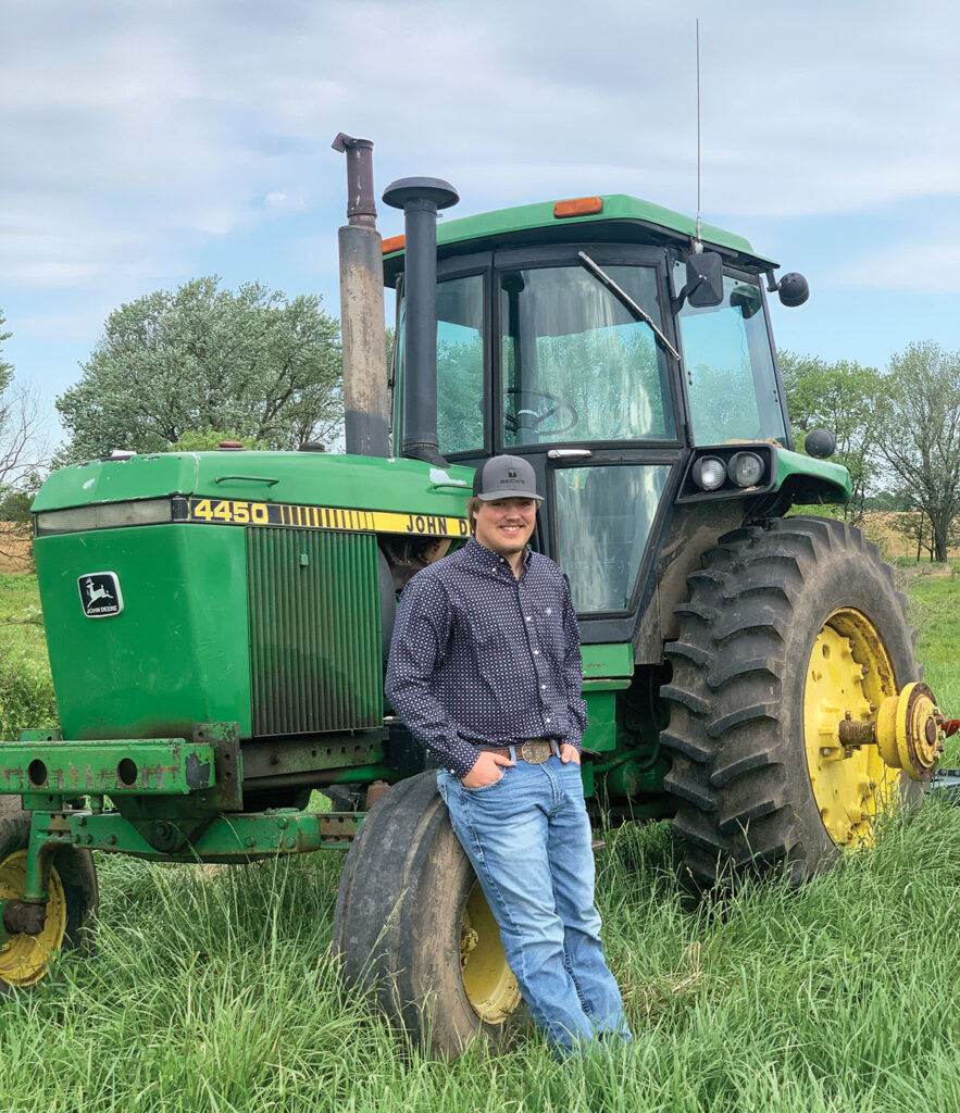 College freshman Austin Etcheson began working for Steel Rain Irrigation at a young age, which has allowed him to buy is own cattle and equipment. Photo by Rachel Harper.