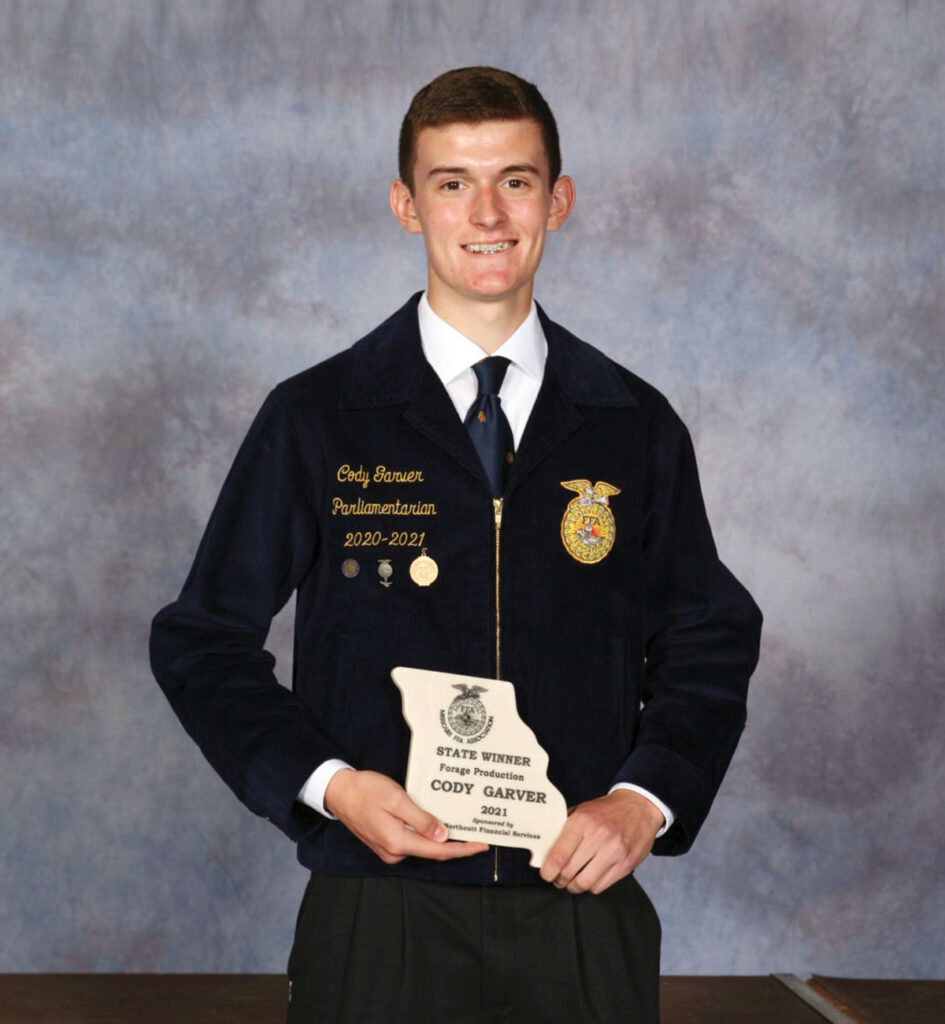 Cody Garver with his Forage Production award. Submitted Photo. 