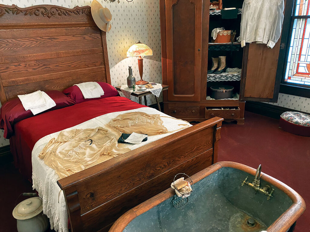 Miss Laura's living quarters, the parlors and everything is staged and very period correct. A few original articles remain, including a stained-glass window, a table and some original paintings, and clothing items found in the house. Submitted Photo.