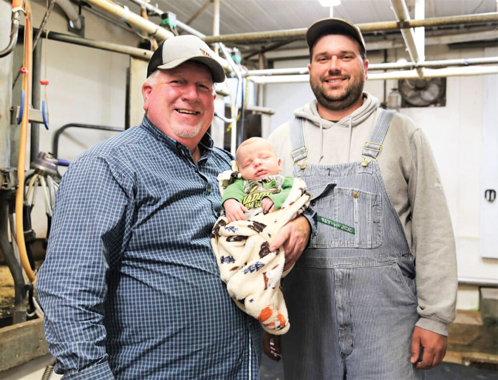 John, Nolan and Trent Miller inside the Miller Dairy Barn. Submitted Photo. 