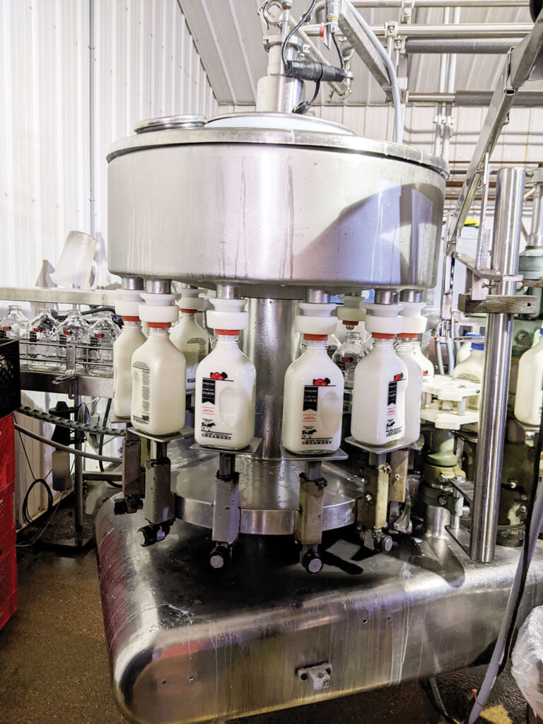 Ozark Mountain Creamery bottling machine. They use glass bottles instead of plastic. Photo by Eileen Manella. 