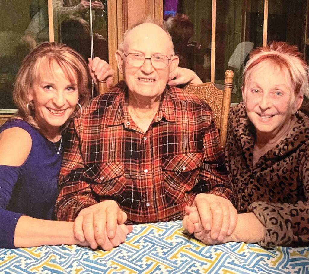 Adrian Murry with his two daughters. Submitted Photo. 