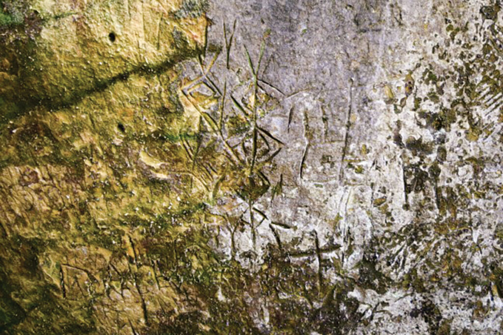 Some of the petroglyphs drawings inside the Indian Rock Cave in Fairfield Bay, Arkansas. Submitted Photo. 