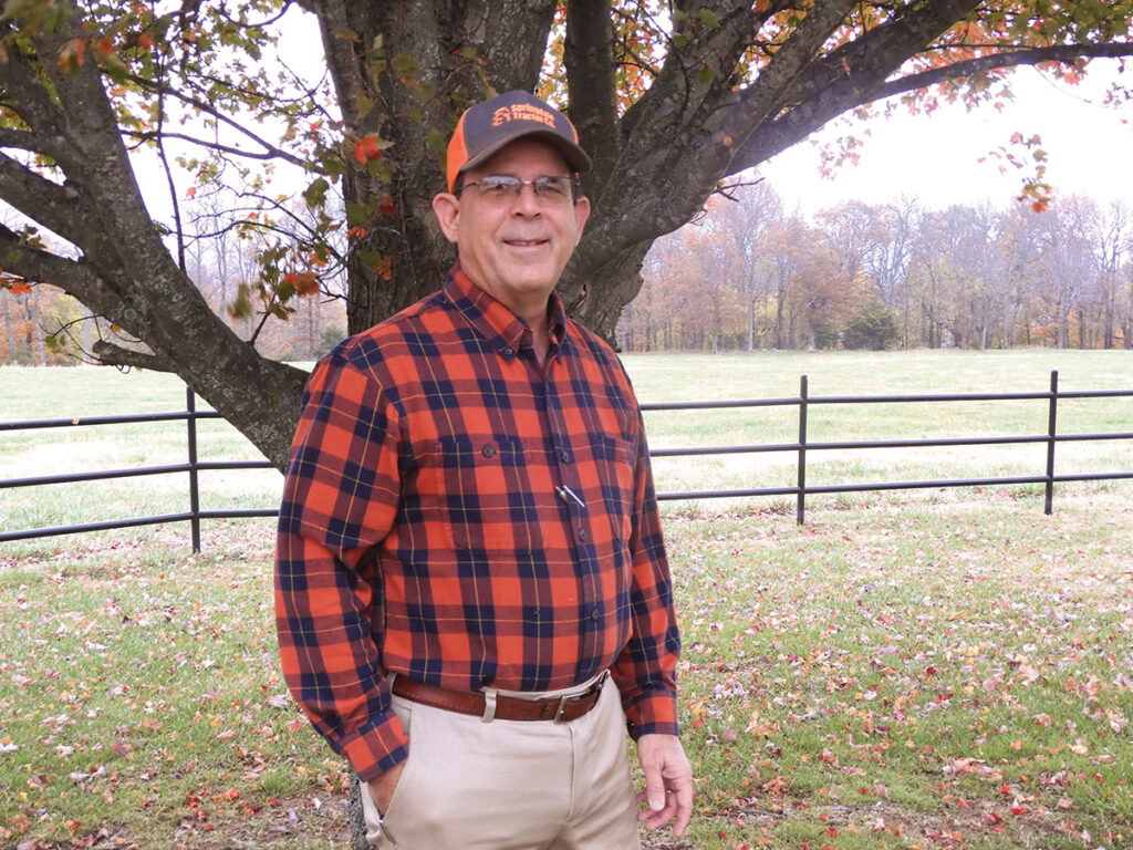 Calvin Tackett of West Fork, Arkansas has worked at Farm Bureau for 40 years as an insurance agent. Photo by Terry Ropp. 