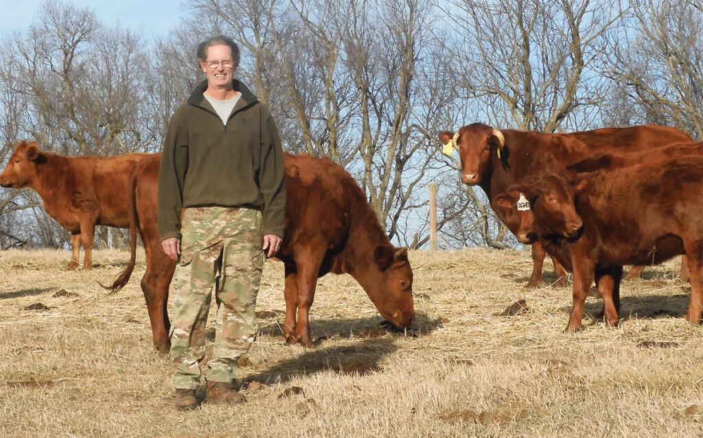 Gary Tucker and his wife Sue Clemons purchased a farm in rural West Fork, Ark., to become farmers after their retirement. Today they offer customers organically-raised beef, chicken and eggs. Photo by Terry Ropp.