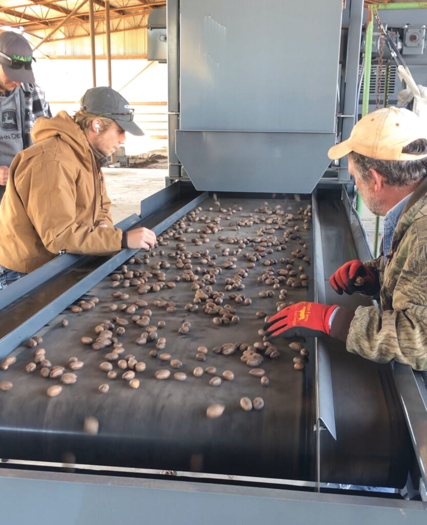 The Maus family learned from Crash the ins and outs of the orchard while gathering the materials and machinery necessary for successful harvests. Submitted Photo. 