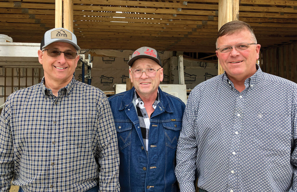 Brothers Leon Stacy (left) and Monty Smith (right) are building larger processing facility in Nevada, Mo. Their parents operated the last processor in the area, which burned in 2005. Also pictured is Bill Jacks, who worked for Leon and Monty’s father. Bill is mentoring the brothers, and educating and training new employees. Photo by Julie Turner-Crawford. 