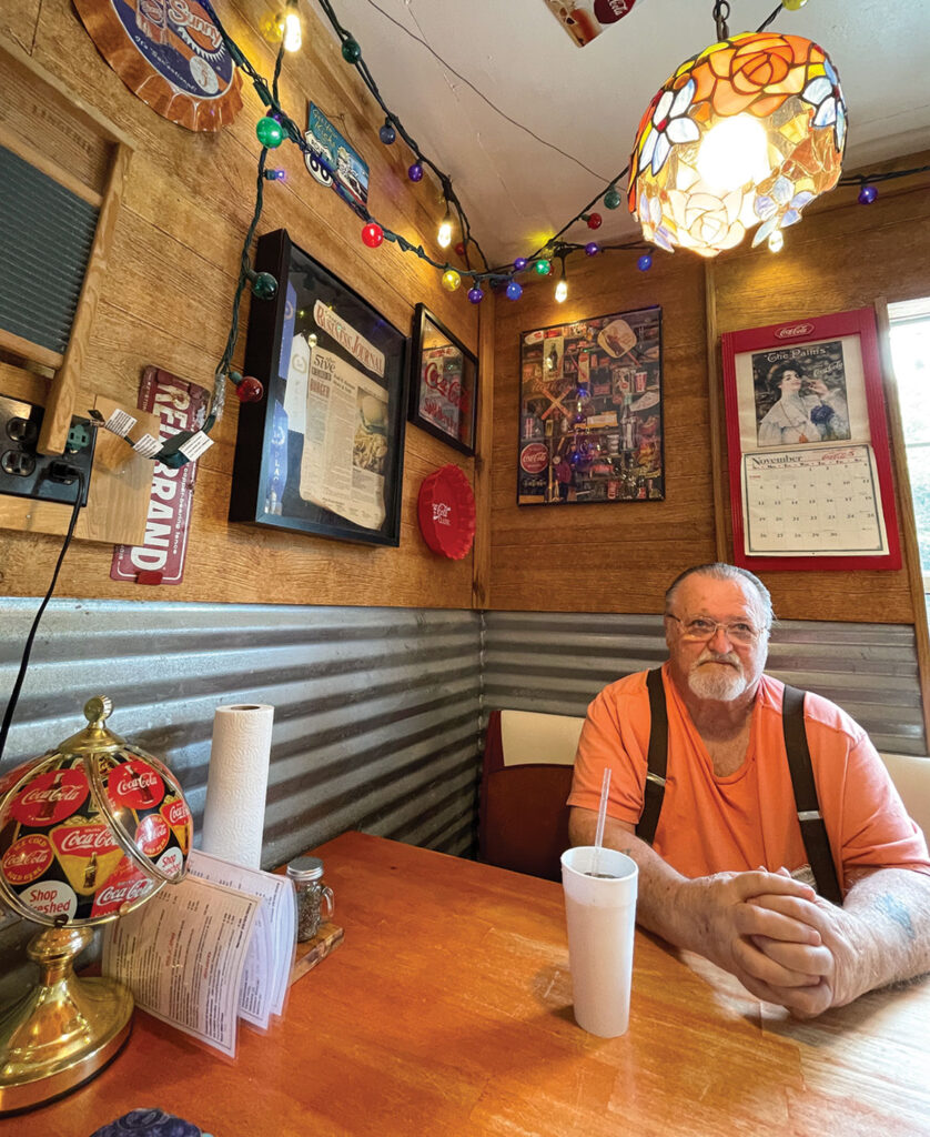 Dr. John Broughton works at Mercy Hospital as a doctor and helps Martha at the restaurant on his days off. Photo by Ruth Hunter. 