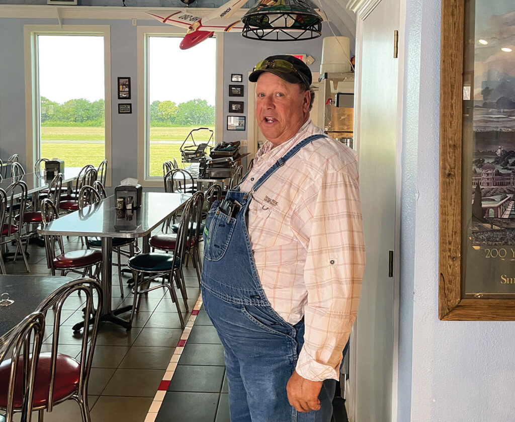 Farmer and pilot Kiman Kingsley also serves up family favorites at The Hanger Kafe. Photo by Ruth Hunter. 