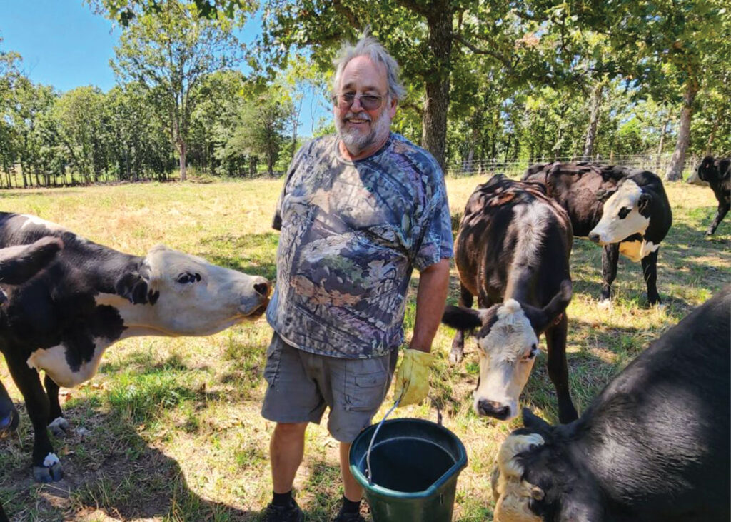 Randy and his sister, Carol Sapp, now own the 126-acre Neasby-Sapp Farm on which they have about 30 head of registered Black Herefords and a few black baldies. Photo by Laura L. Valenti. 