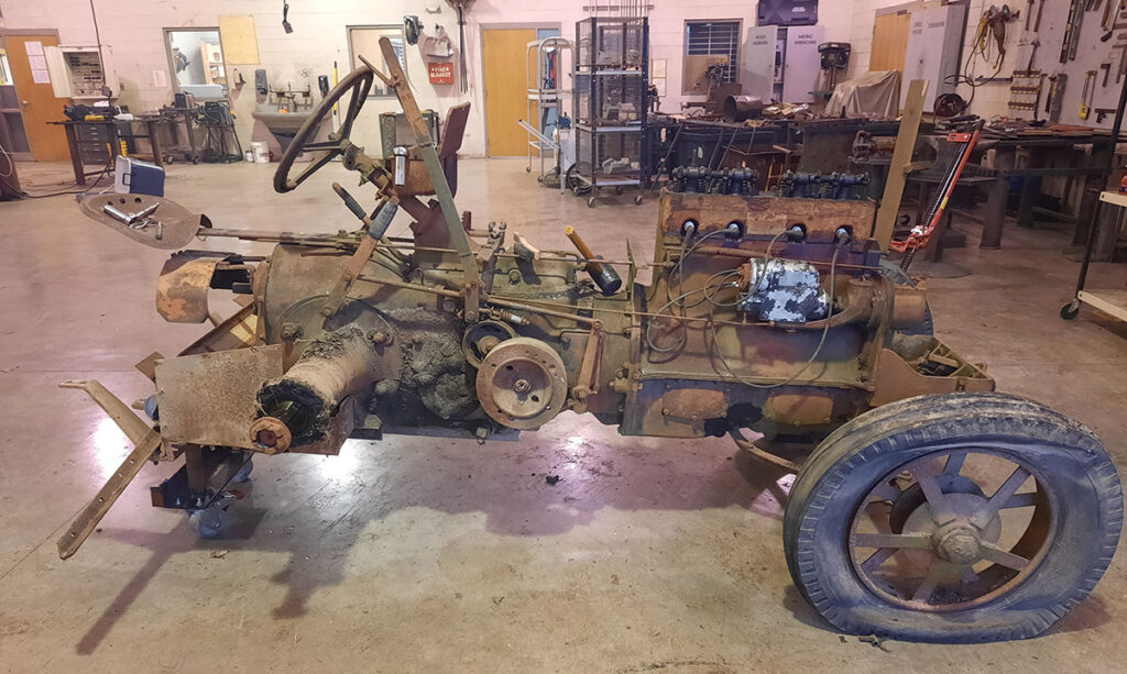 A gentleman donated a tractor to the Marshfield agriculture department, and Caleb gravitated toward the antique tractor. Contributed Photo. 