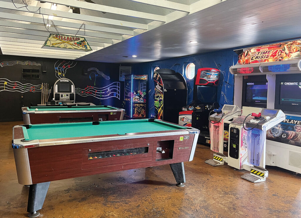 In addition to its delicious food, the Daisy Queen offers a variety of amenities that make it a popular hangout spot. The back room features a pool table and video games, providing entertainment for customers of all ages. Photo by Julie Kohl.