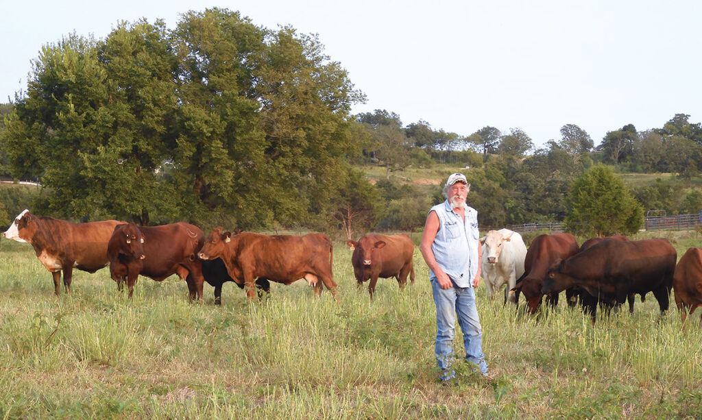 Gene works the 1000 acre farm along with farmhand Forrest Dobbs. Photo by Terry Ropp.