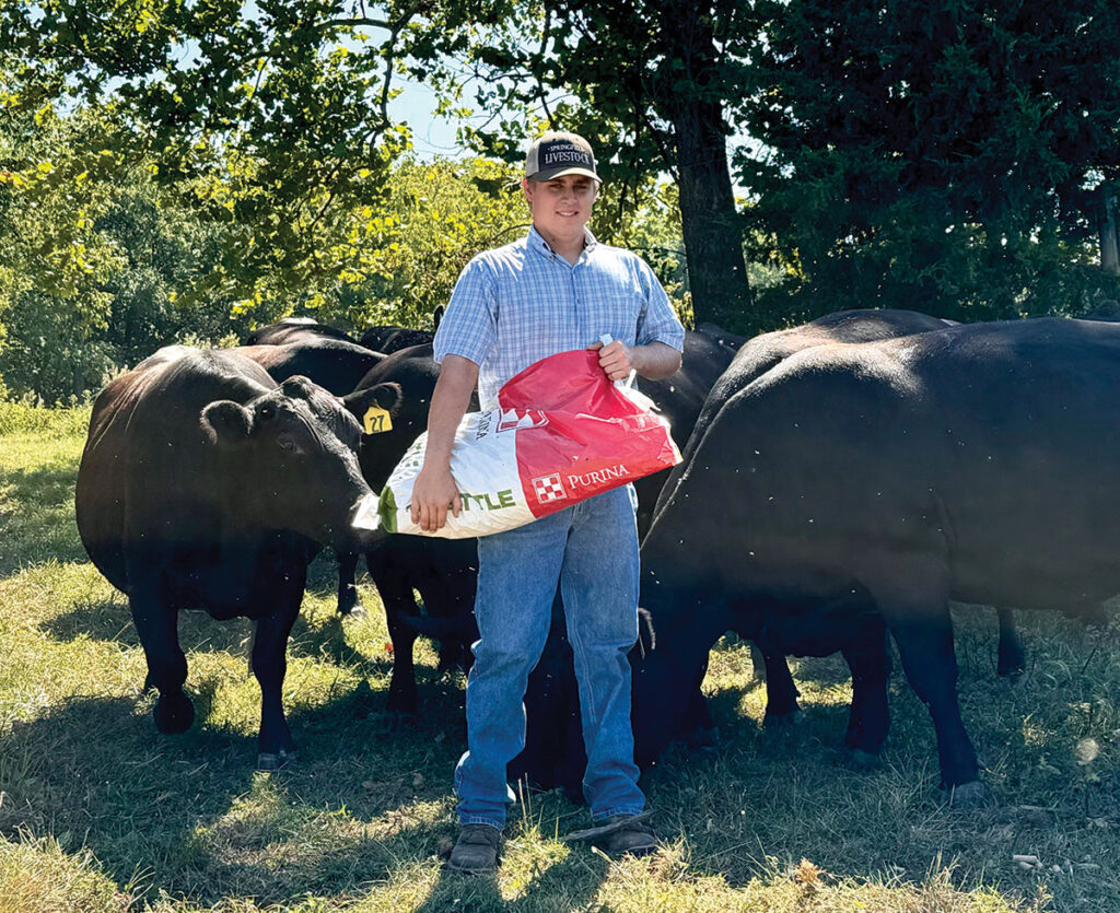 Chase Hultgren, 23, owns and operates Hultgren Angus, a 12 head black Angus cow/calf operation on 400 rented acres located in rural Greene and Lawrence counties in Missouri. Photo by Jaynie Kinnie-Hout.