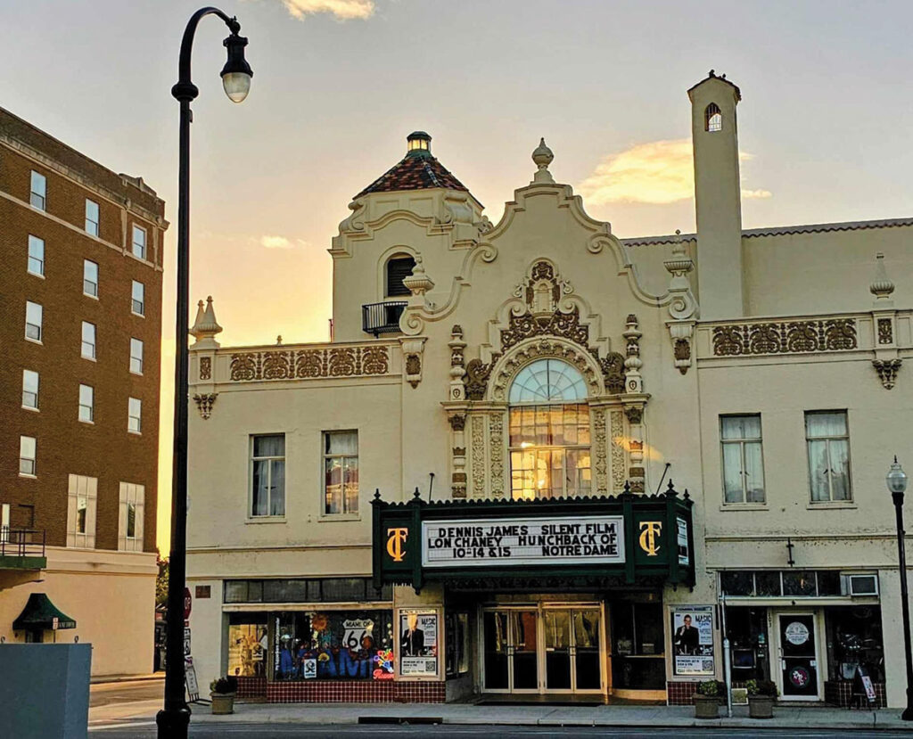 Walk up to the theater, and you will see the Spanish Colonial Mission-style exterior. The Louis XV-style interior features a huge balcony – its beams and posts unexposed. Photo Courtesy of The Coleman Theatre. 