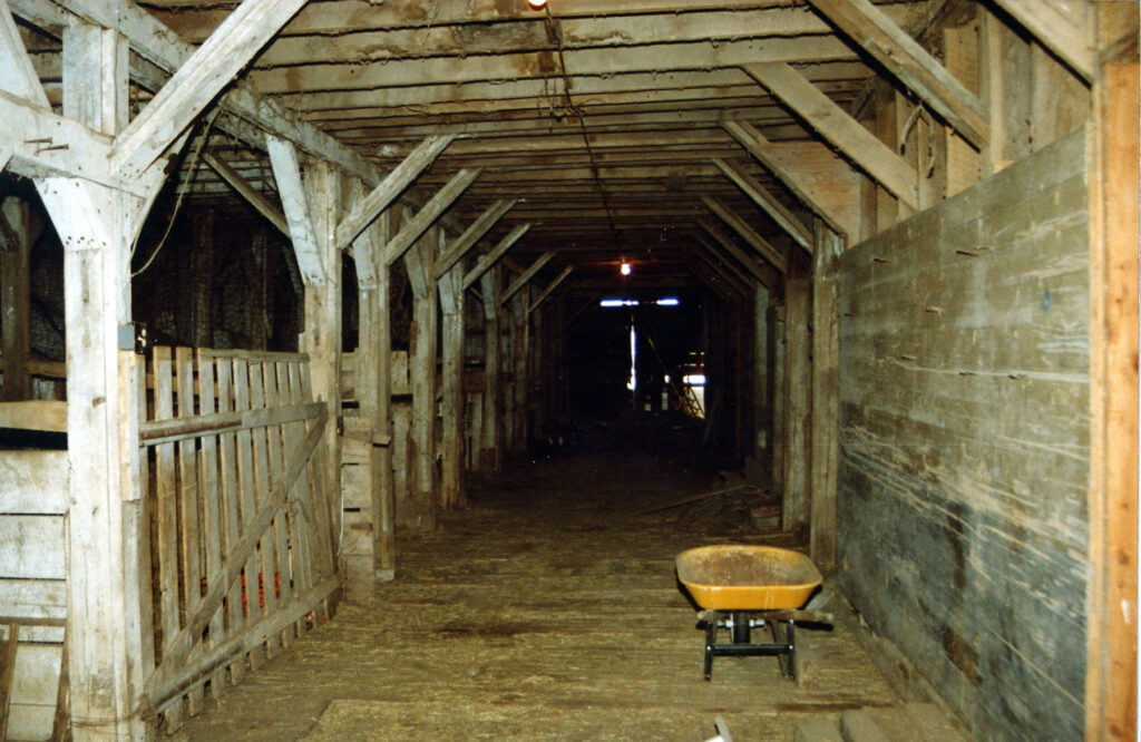 The first floor has two aisles of stalls, with dirt floors as part of the barn’s foundation. One aisle holds sixteen stalls for large draft horse, and the other contains ten stalls for smaller horses and stallions. Contributed Photo. 