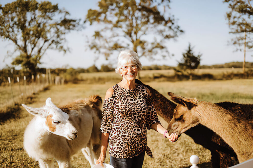 Myra Grayson with her llamas at Grays Lland Acres in Pryor Oklahoma. Submitted Photo.