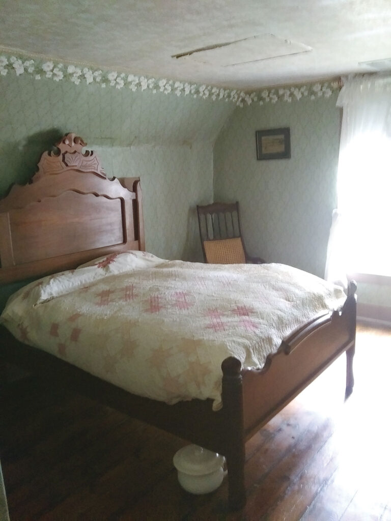 Bedroom with chamber pot under the bed. Submitted Photo.