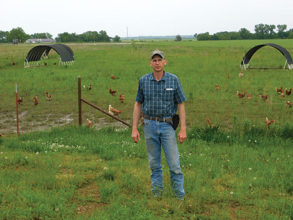 Paul Schneider and his family have an egg operation, as well as organic crops. Photo by Neoma Foreman.