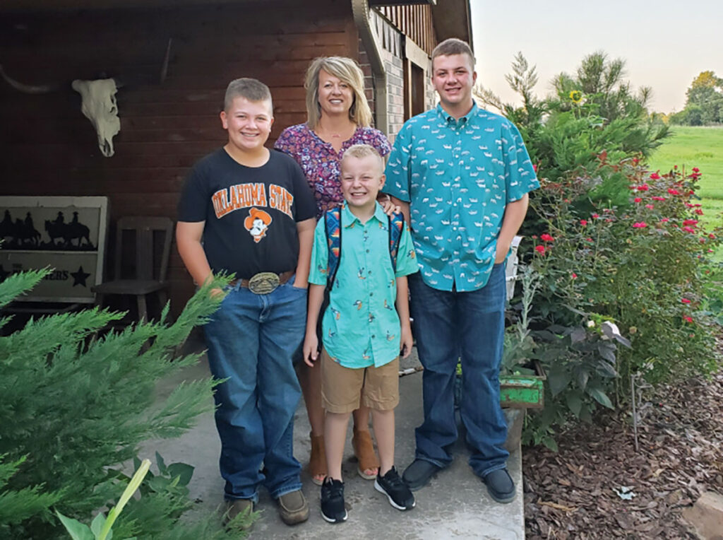 DeLozier Livestock is a family operation. Pictured are Devin DeLozier’s wife Becky, and sons Dax, Dacen and Dade. 