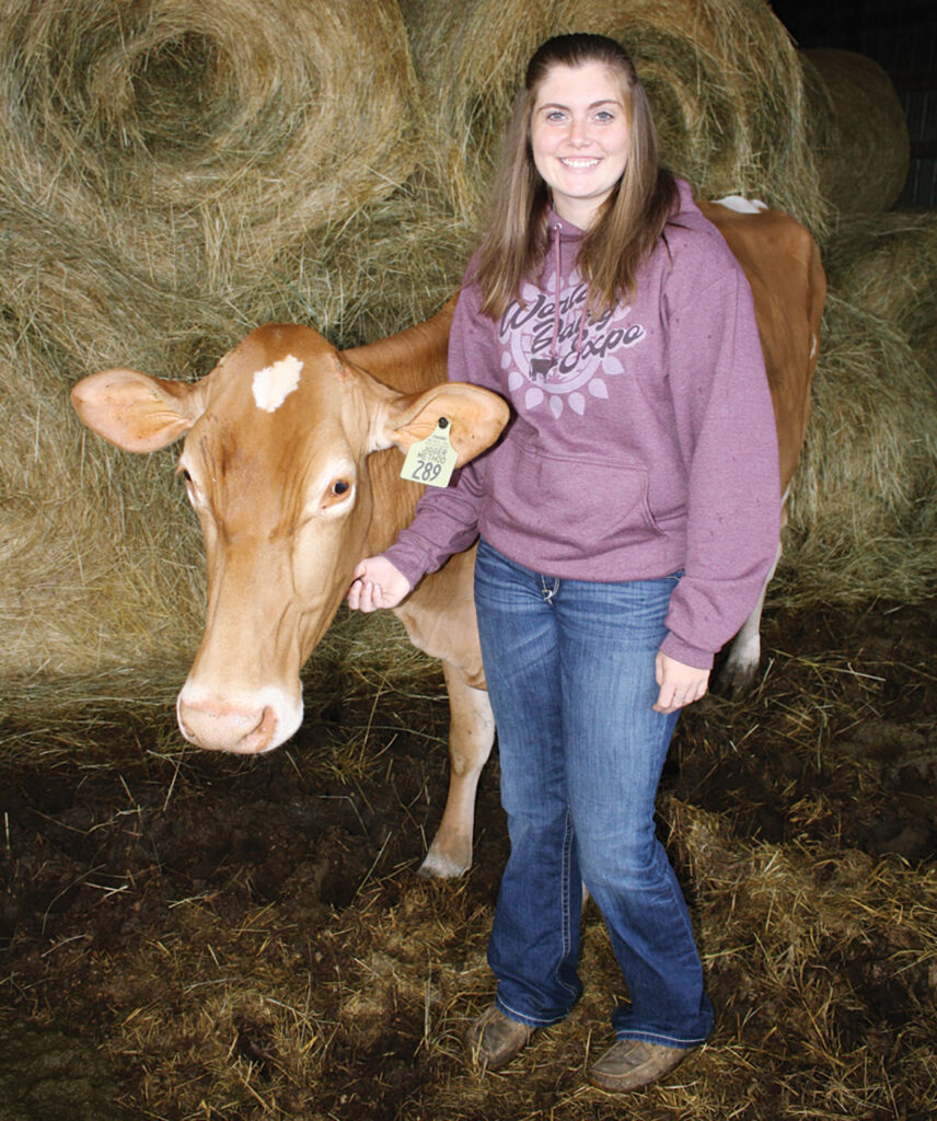 Whitney Yerina of Phillipsburg, Missouri garners big win at the World Dairy Expo. Photo by Julie Turner-Crawford.