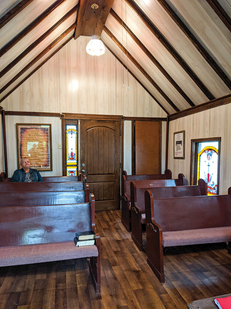Inside the tiny chapel that Pastor Terry built from a chicken coop. Photo by Eileen J. Manella.