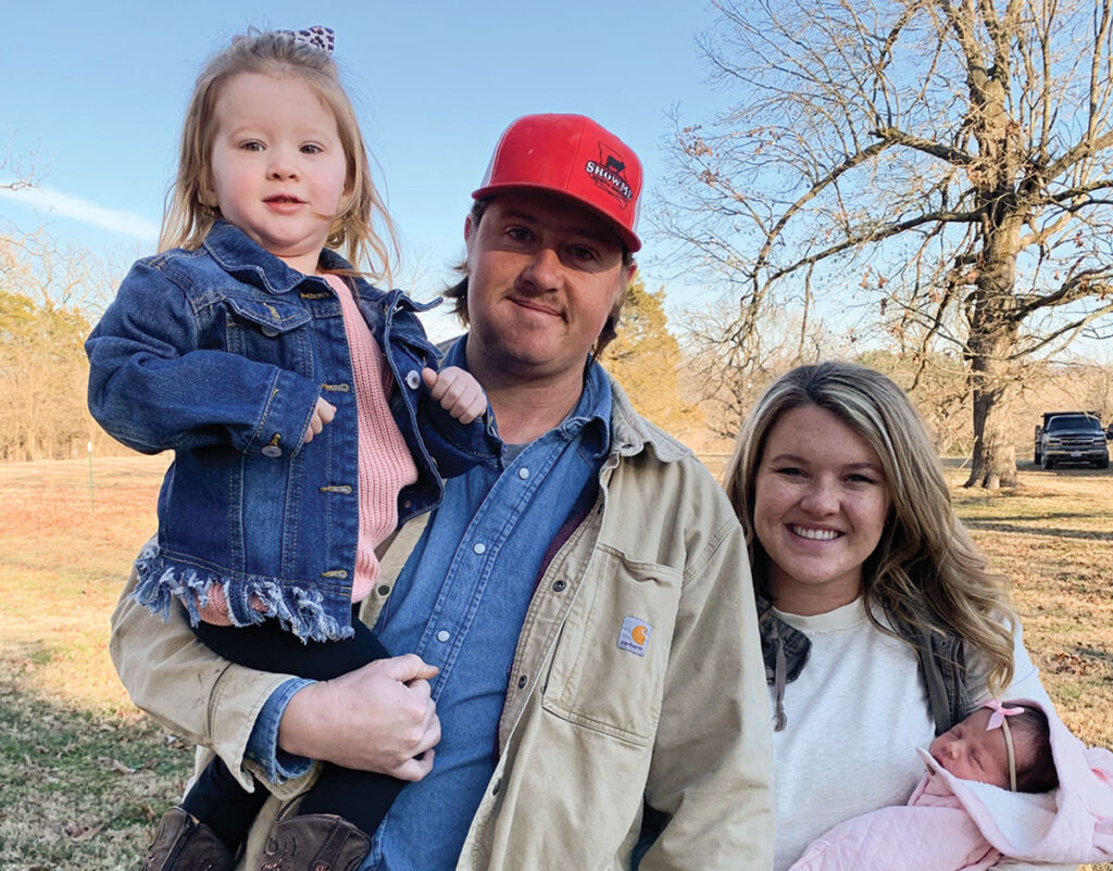 Calvin and Jamie Dryer of Louisburg, Missouri with their two daughters. Photo by Amanda Bradley.