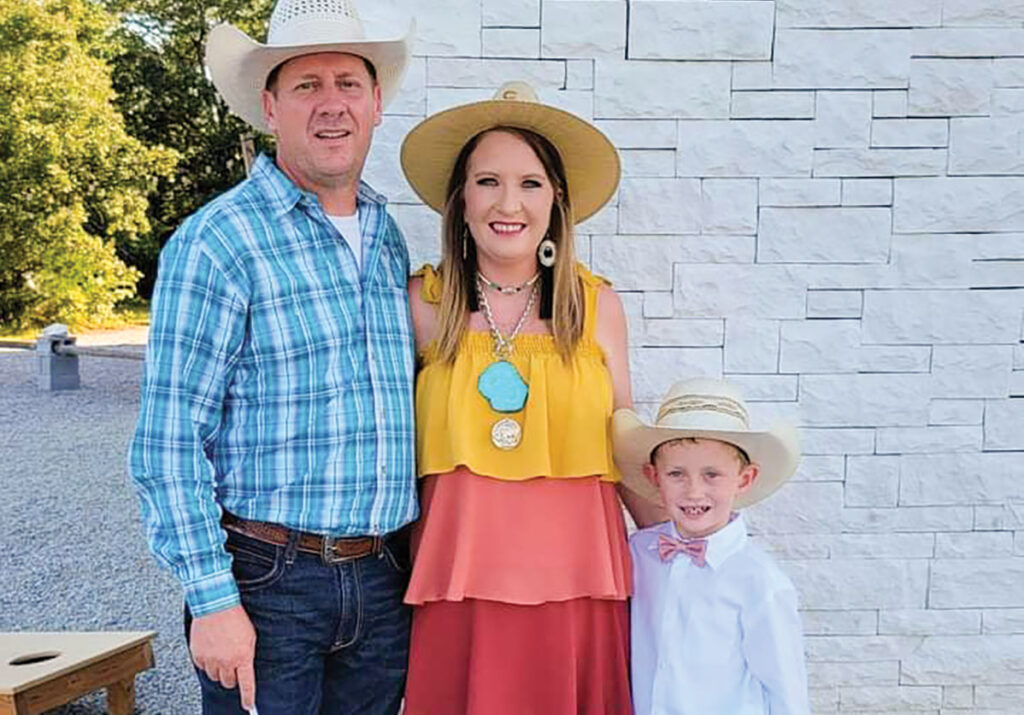Isaac Melin, pictured with his wife Sheala and stepson Tate, strive to produce high-quality beef. Submitted Photo. 