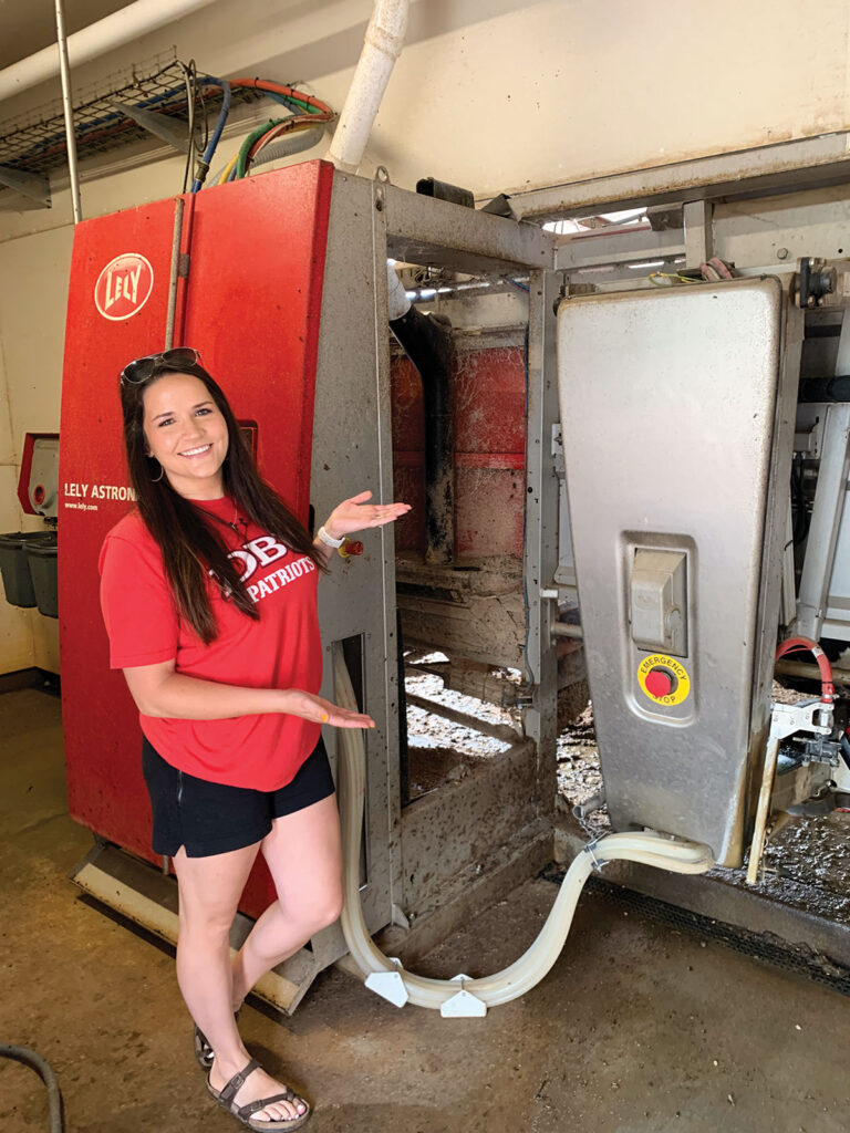Debbie Gettle of Gettle Dairy Farm in Pleasant Hope, Missouri showing their robotic milking system. Photo by Amanda Bradley.