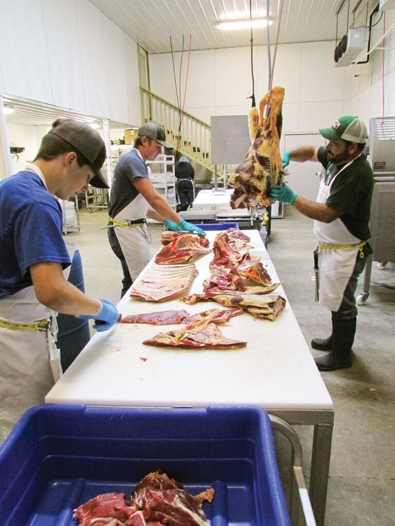 Hard at work at Cabool Kountry Meats. Photo by Sheila Harris.