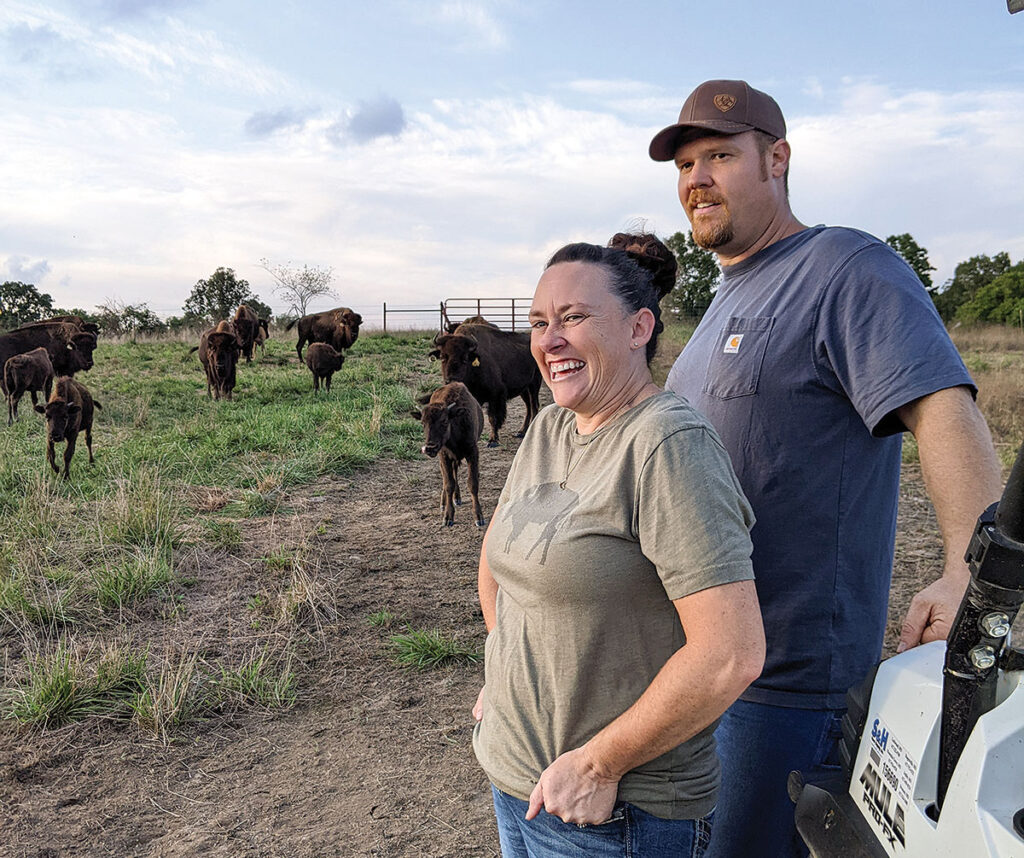 Daniel and Nancy Bohnenkamp maintain two bison herds on their Ozarks farm. They produce meat and breeding stock. Photo by Eileen Manella. 