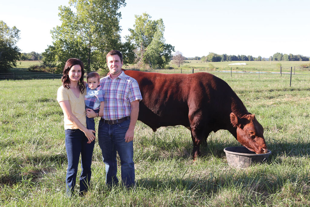 Brett Naylor, his wife Brittney and son Hudson raise purebred Shorthorn and Angus cattle in Polk County, Mo. Photo by Julie Turner-Crawford. 