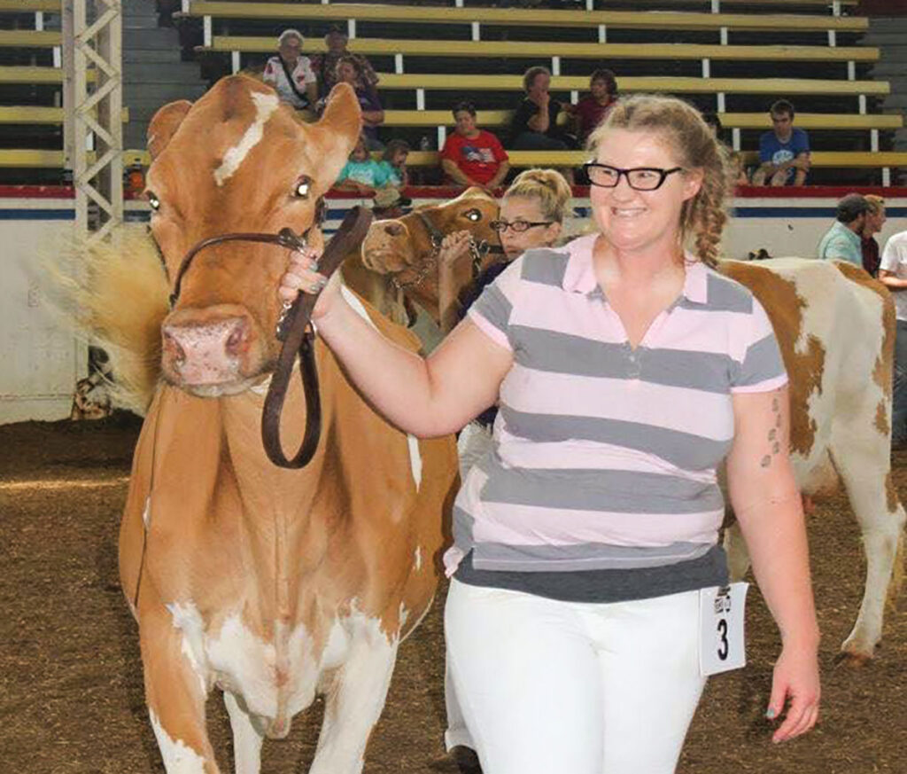 Cindy Wilson of Pleasant Hope, Missouri has been a nurse for 19 years. She has bred registered Guernsey dairy cattle for decades. Submitted Photo. 