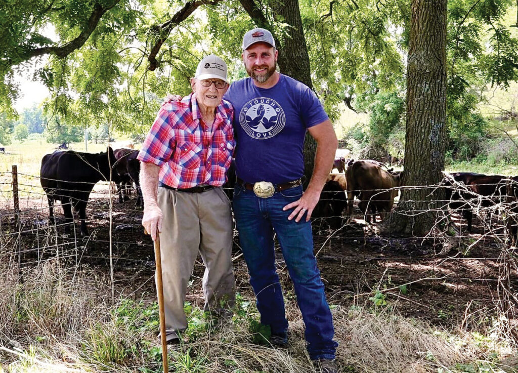 Adrian Murray, left, and his grandson Justin Williams, are the third and sixth generations to operate their family farm. Photo by Jaynie Kinnie-Hout