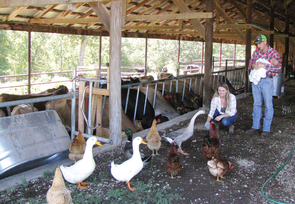 Chris and Sheena Crandall moved to the Ozarks to start their own farm.  Photo by Brenda Brinkley. 