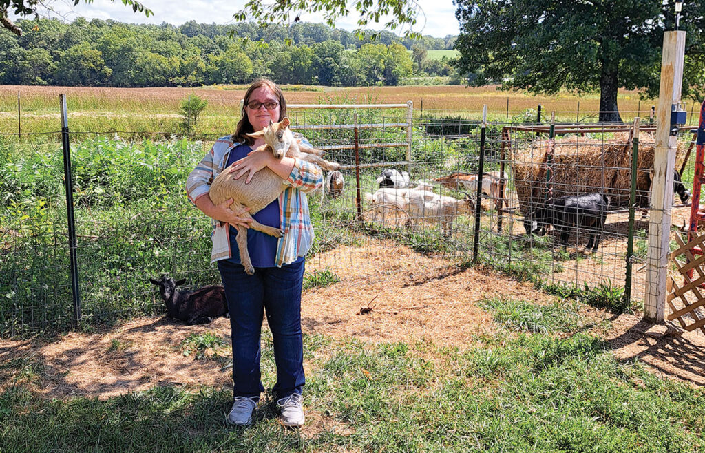 Kristina Van Aken of Mountain Grove, Missouri is the lunch lady at Mountain Grove High School. Her and her mother Paula raise Nigerian Dwarf goats. Photo by Eileen Manella. 