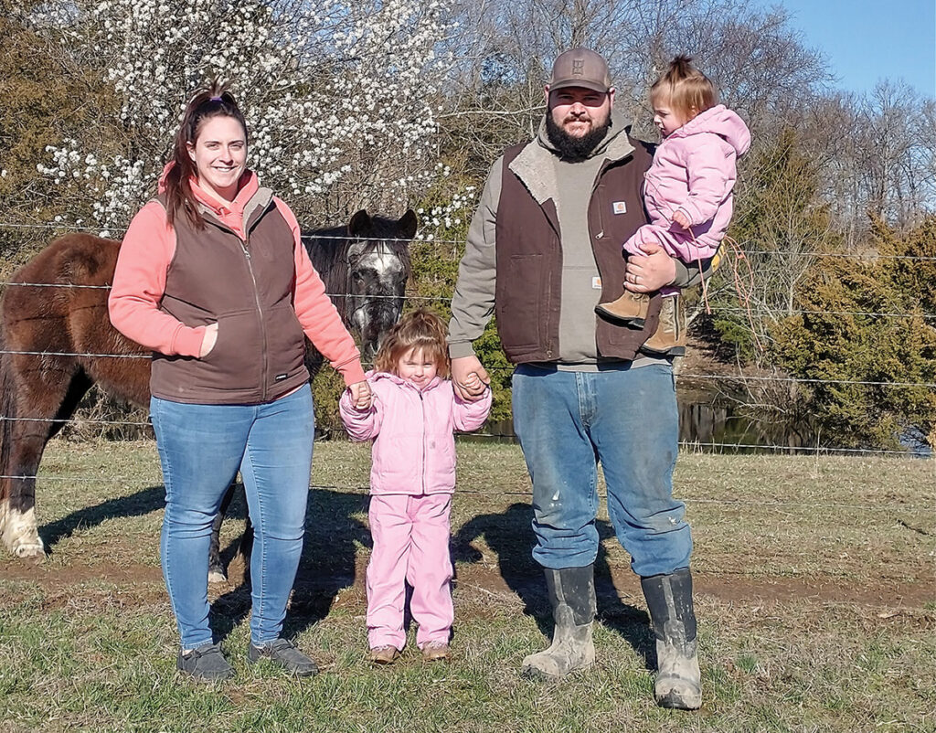 Zeb and Joanna Ritzheimer with their two daughters on their farm in Buffalo, Missouri. Submitted Photo. 