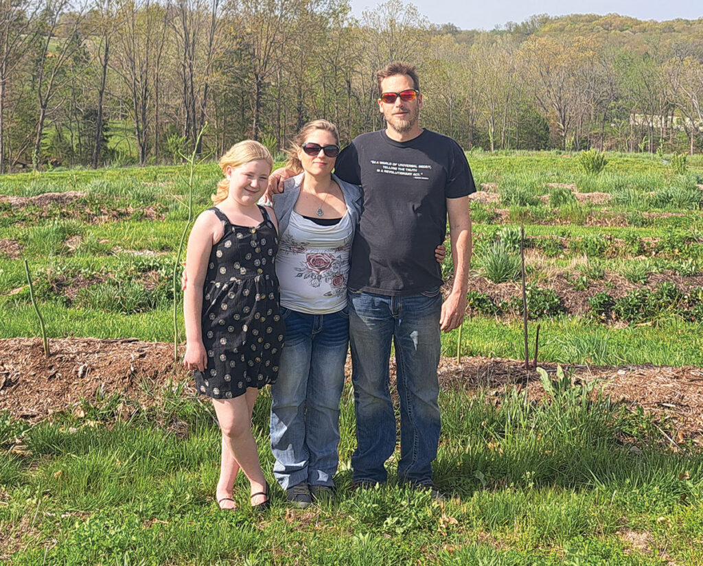A dream of raising animals and crops brought Nate and Brittany Gellman, and their daughter Emily to the Ozarks. Photo by Eileen J. Manella. 