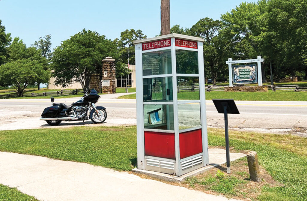 The Prairie Grove (Ark.) 
Telephone Company continues to operate an Airlight Outdoor Telephone Booth. Free local calls can be made from the phone booth. Photo by Pete Boaz
