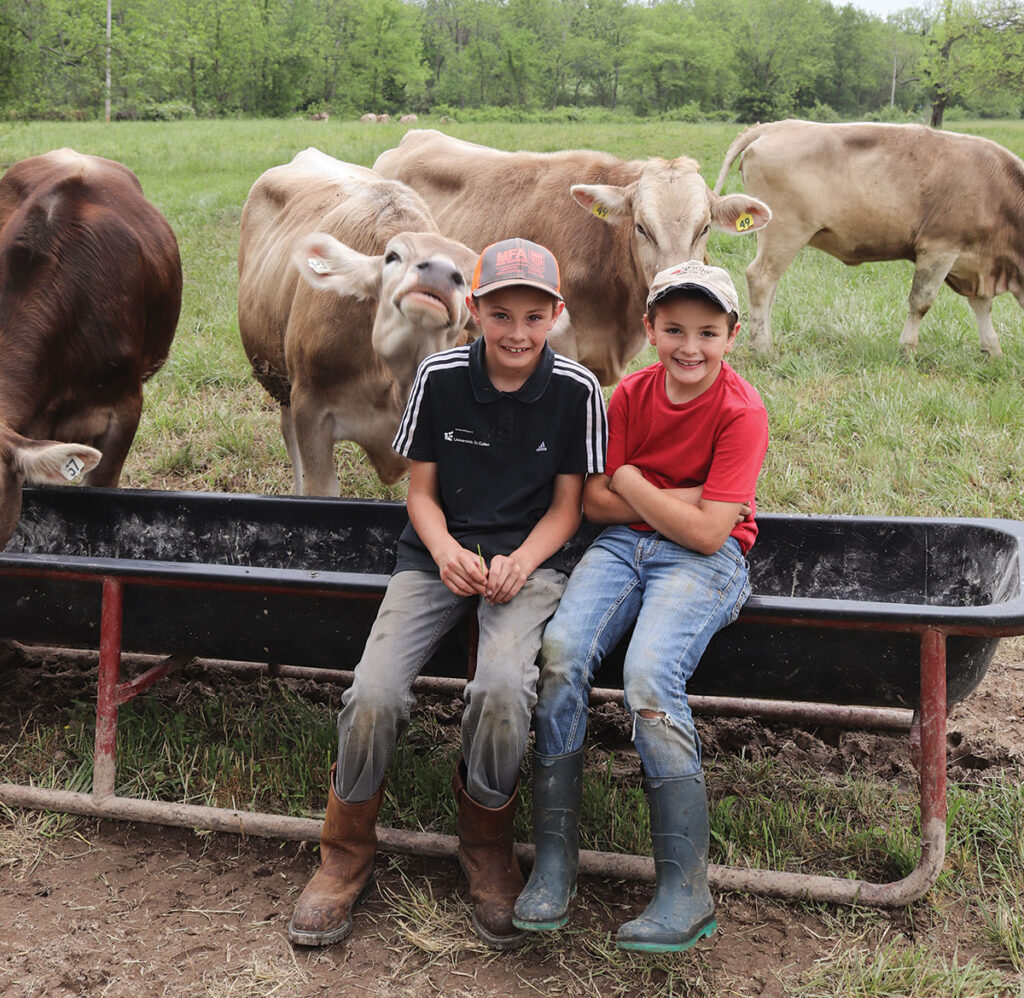 Jacob and Josiah Roth with a funny cow. Photo by Julie Turner-Crawford. 
