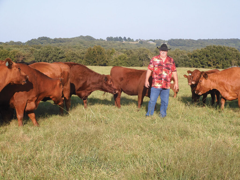 David Kruckemeyer utilizes a rotational grazing system for his Red Angus cattle operation. David and his wife, Renea, are originally from Texas and moved to the Ozarks after their retirement. Photo by Terry Ropp. 