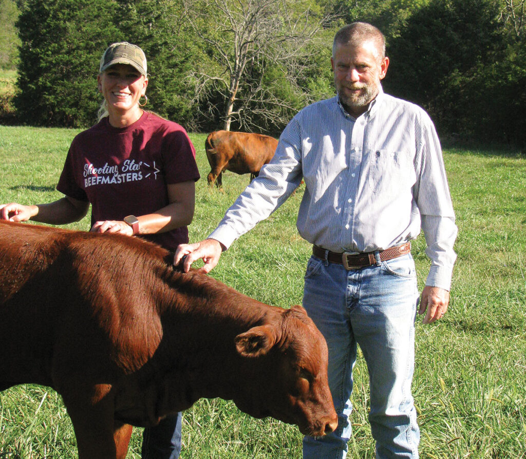 Bruce and Courtney Bassler appreciate the maternal side of Beefmaster cattle. Photo by Brenda Brinkley. 