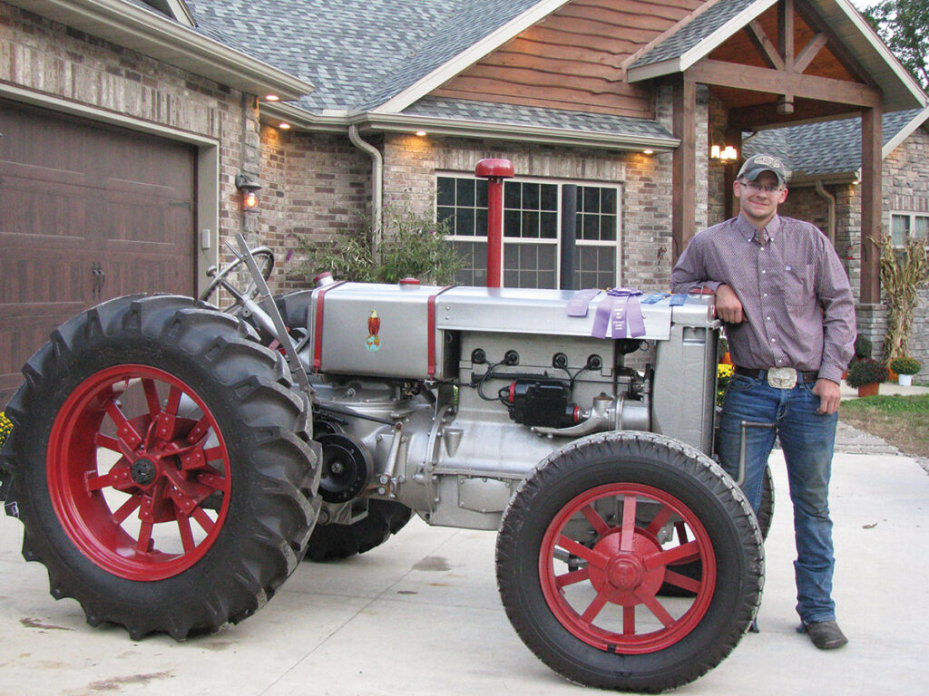 Caleb Leightner restores a more than 90-year-old tractor from the ground up. Photo by Brenda Brinkley. 