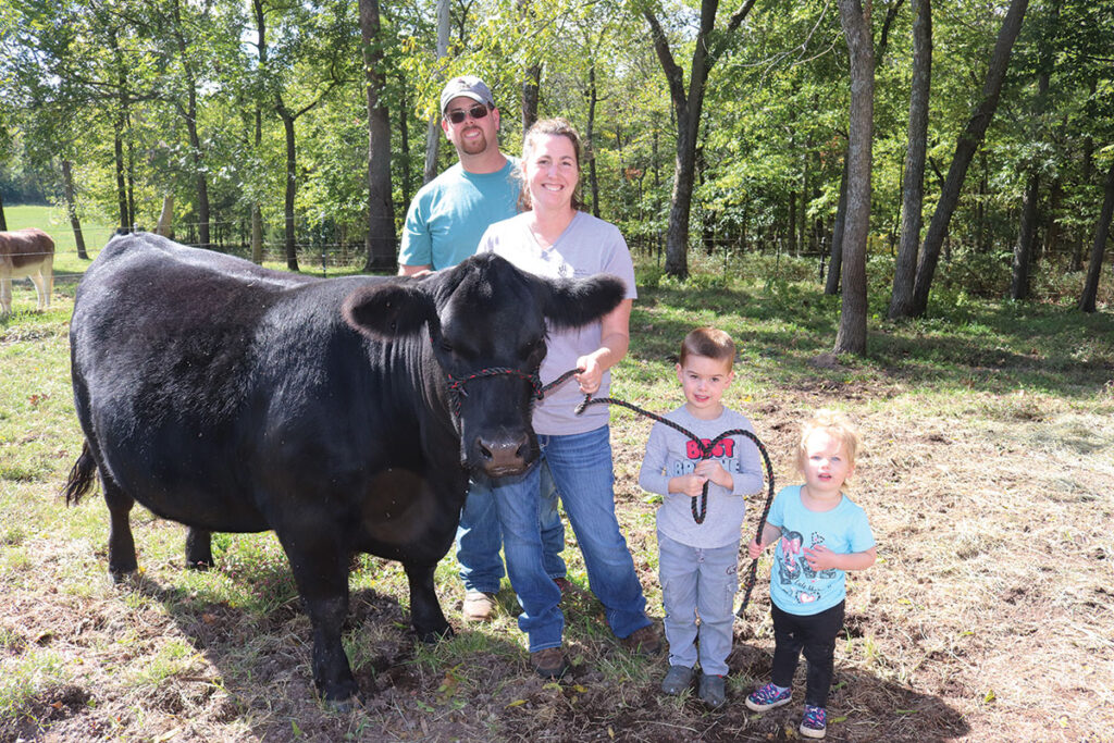 Caleb, Tara, Gabe and Reagan Minor are growing their registered cattle operation. Photo by Julie Turner-Crawford. 