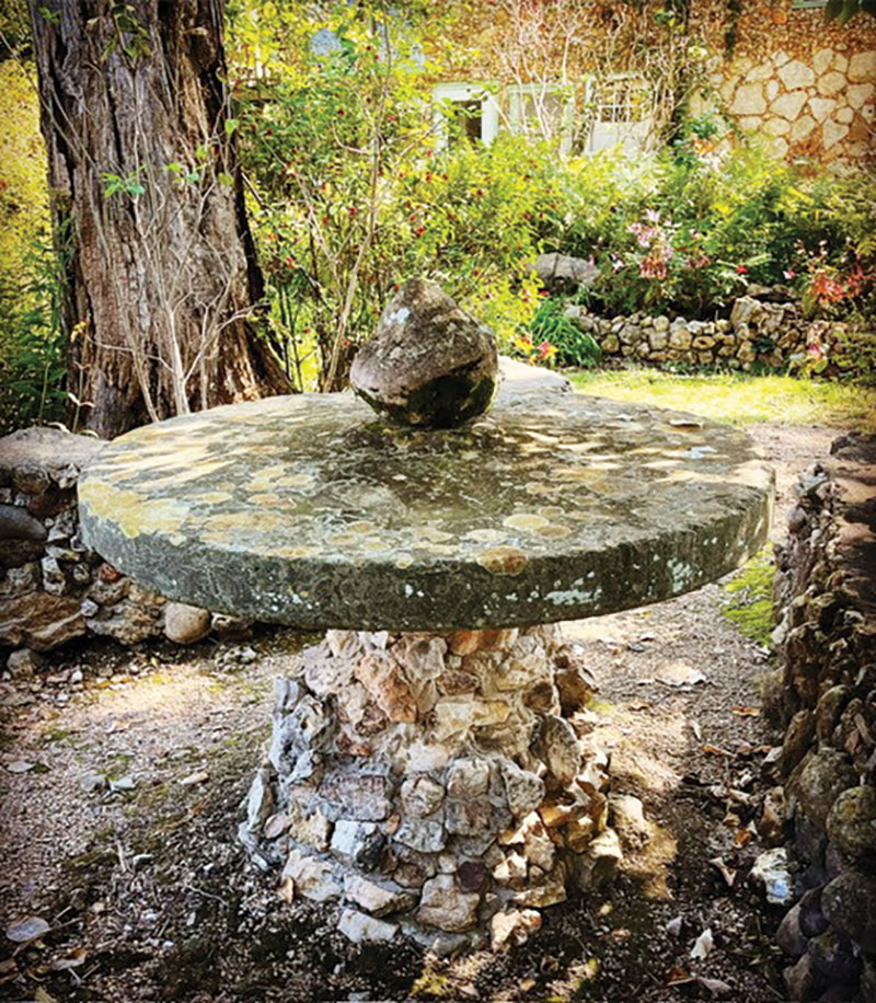 There is a bench sitting area made completely out of rocks that Elise made for her family in the early 1930s. Contributed Photo. 