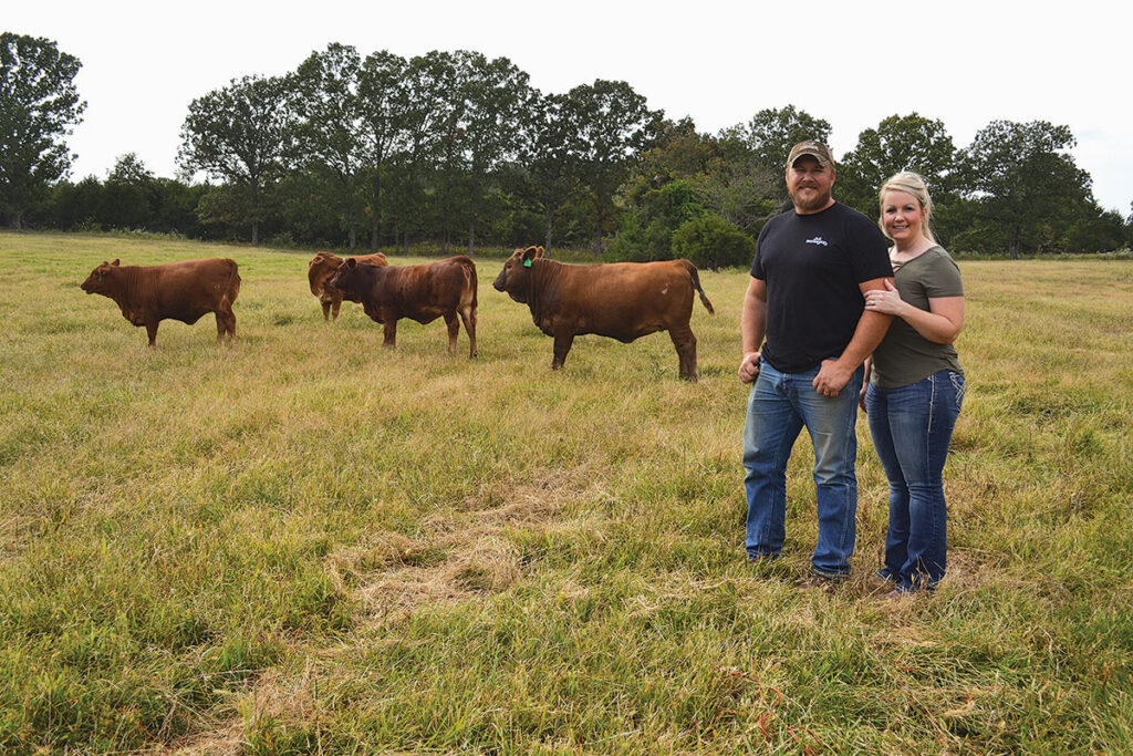 Jason and Ashlae Simmons, along with their sons, are growing a registered Beefmaster herd. Photo by Laura L. Valenti. 