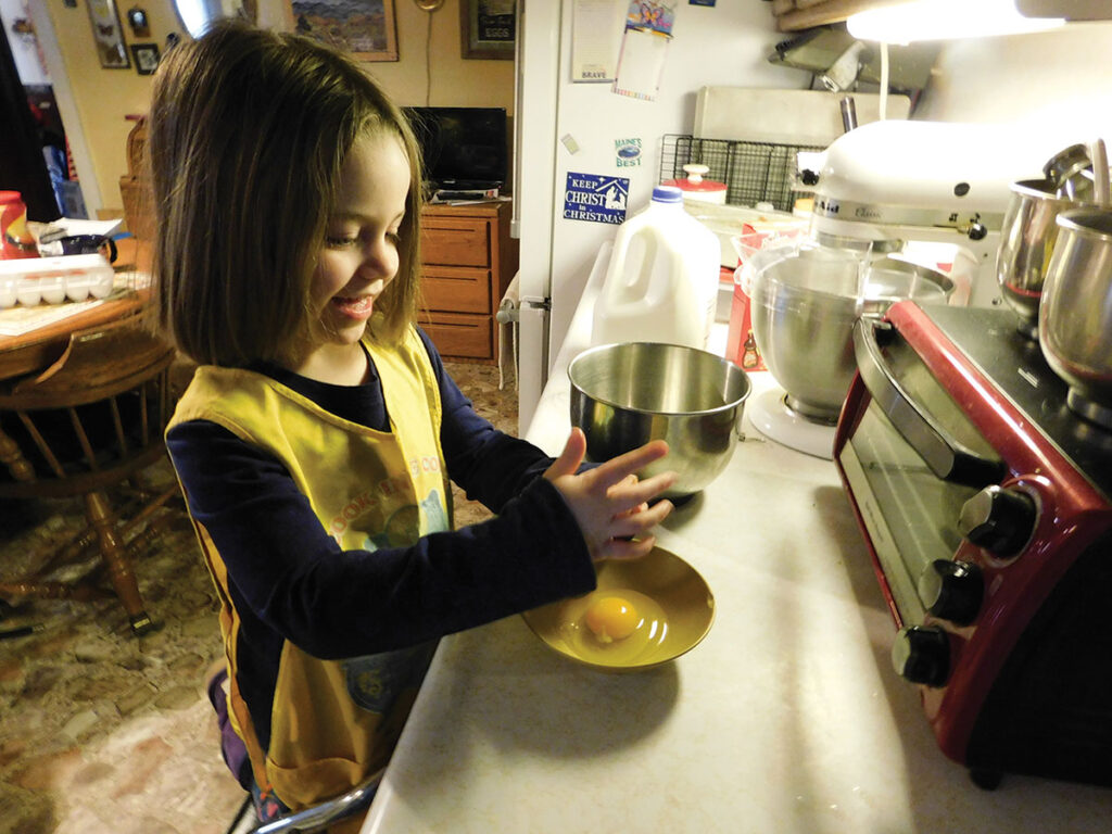 Gentry Leah Budd spends time in the kitchen to “help cook”. Contributed Photo. 